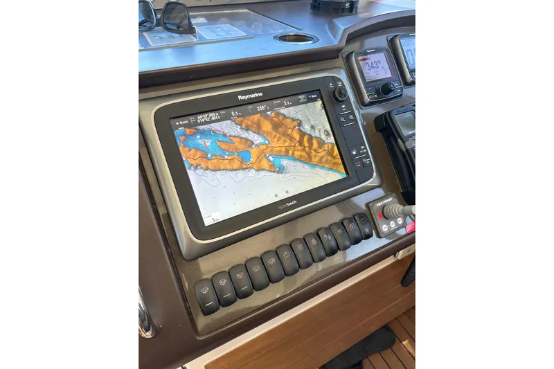  Yacht Photos Pics Navigation system on 2016 Princess V45 yacht dashboard with Raymarine display.