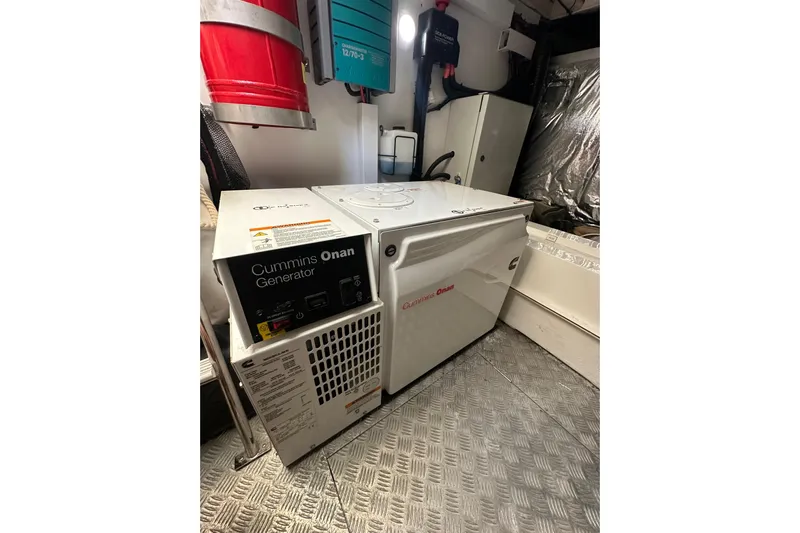  Yacht Photos Pics Cummins Onan generator in 2016 Princess V45 yacht engine room.