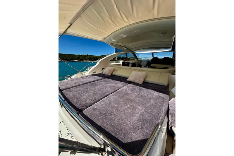  Yacht Photos Pics Luxurious 2016 Princess V45 yacht with sunbathing area and scenic ocean view.