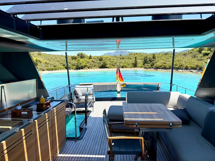  Yacht Photos Pics Luxurious 2024 Cranchi Sessantasette 67 yacht interior with stunning ocean view.