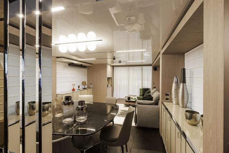  Yacht Photos Pics Luxurious interior of 2024 Cranchi Sessantasette 67 yacht with modern decor and elegant furnishings.