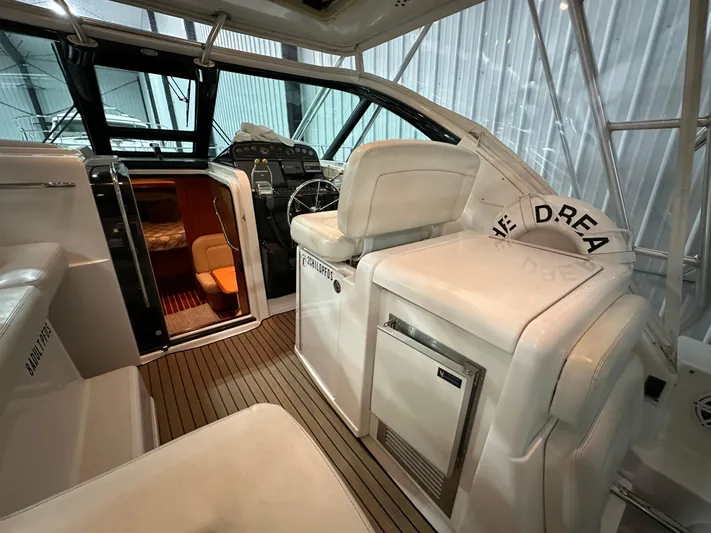  Yacht Photos Pics 2006 Tiara Yachts 3600 Open interior with helm, seating, and cabin entrance.