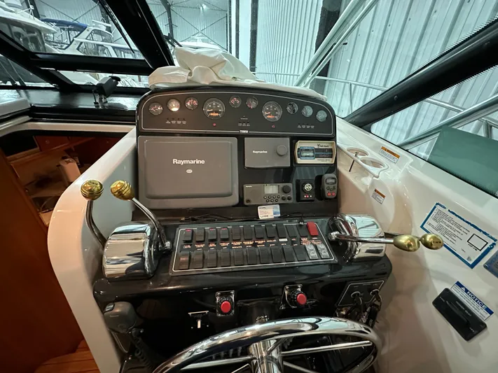  Yacht Photos Pics Control panel of a 2006 Tiara Yachts 3600 Open, featuring navigation and throttle controls.