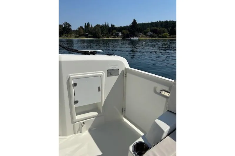 Sweet & Salty Yacht Photos Pics 2019 Jeanneau Velasco 37F boat interior with open hatch, scenic water view.