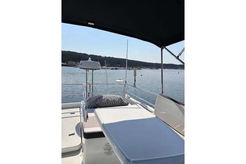 Sweet & Salty Yacht Photos Pics 2019 Jeanneau Velasco 37F yacht deck with scenic water view.