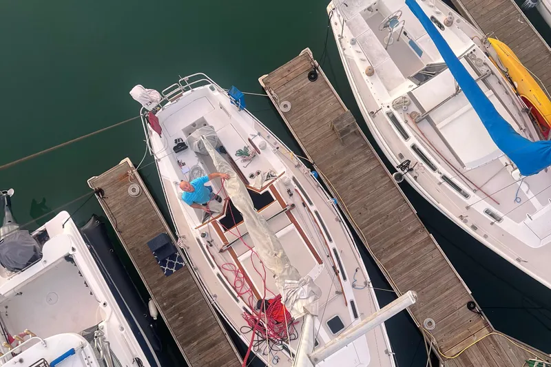  Yacht Photos Pics Overhead view of a 1996 Catalina 400 sailboat docked at a marina.