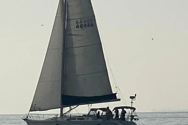  Yacht Photos Pics Sailing yacht Catalina 400, 1996 model, cruising on calm waters.