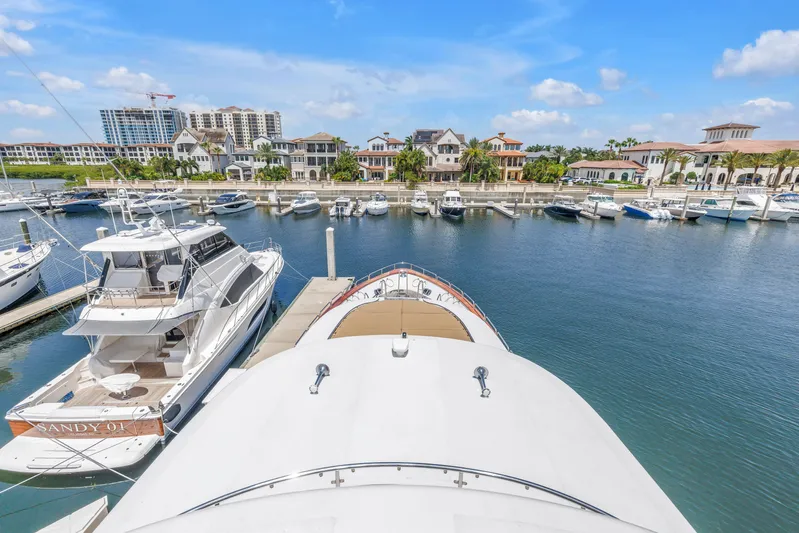 Star Saphire Yacht Photos Pics Luxury yachts docked at marina, featuring 2007 Bilgin 117 model, with waterfront homes in background.