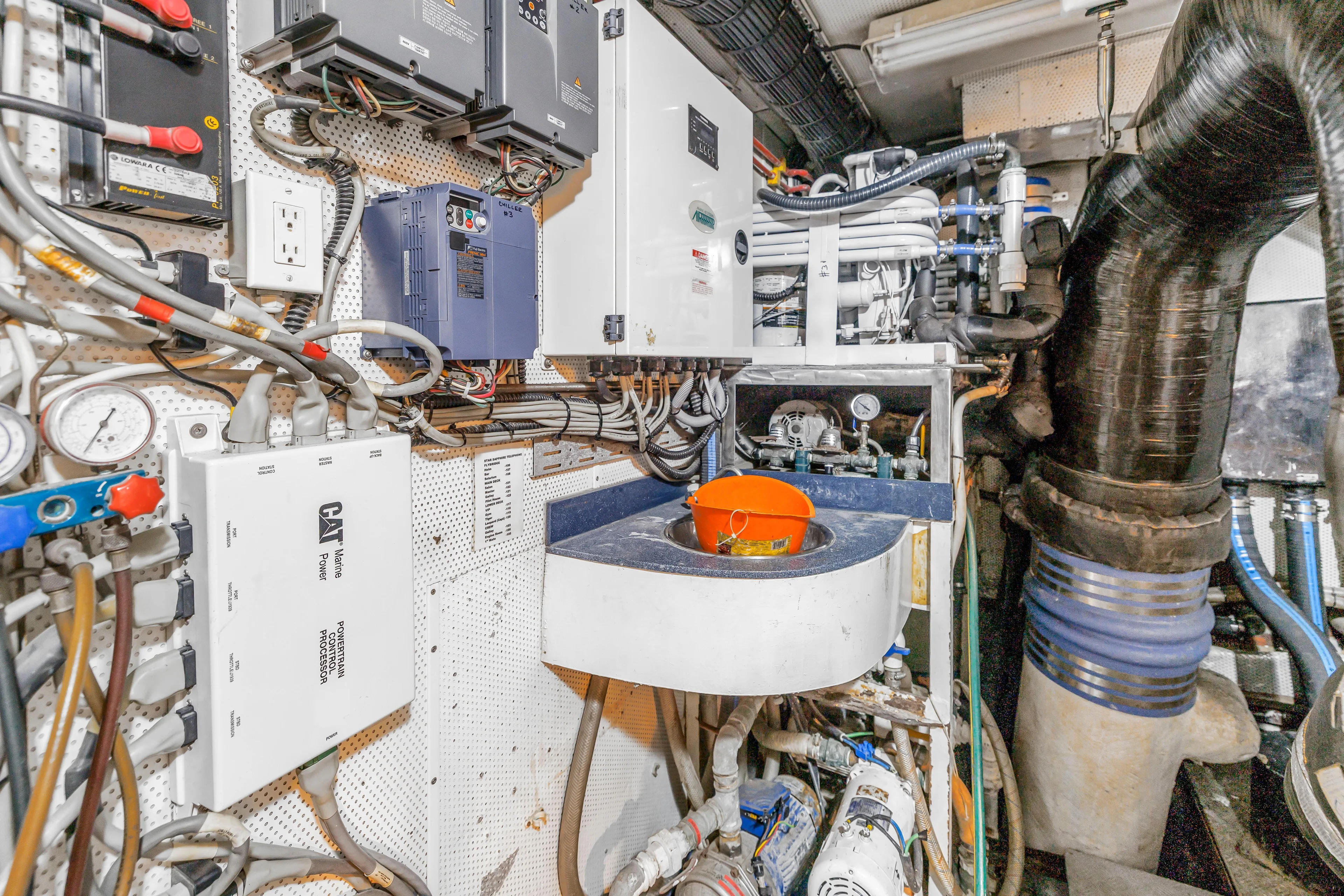 Star Saphire Yacht Photos Pics Engine room of a 2007 Bilgin 117 yacht with complex machinery and wiring.