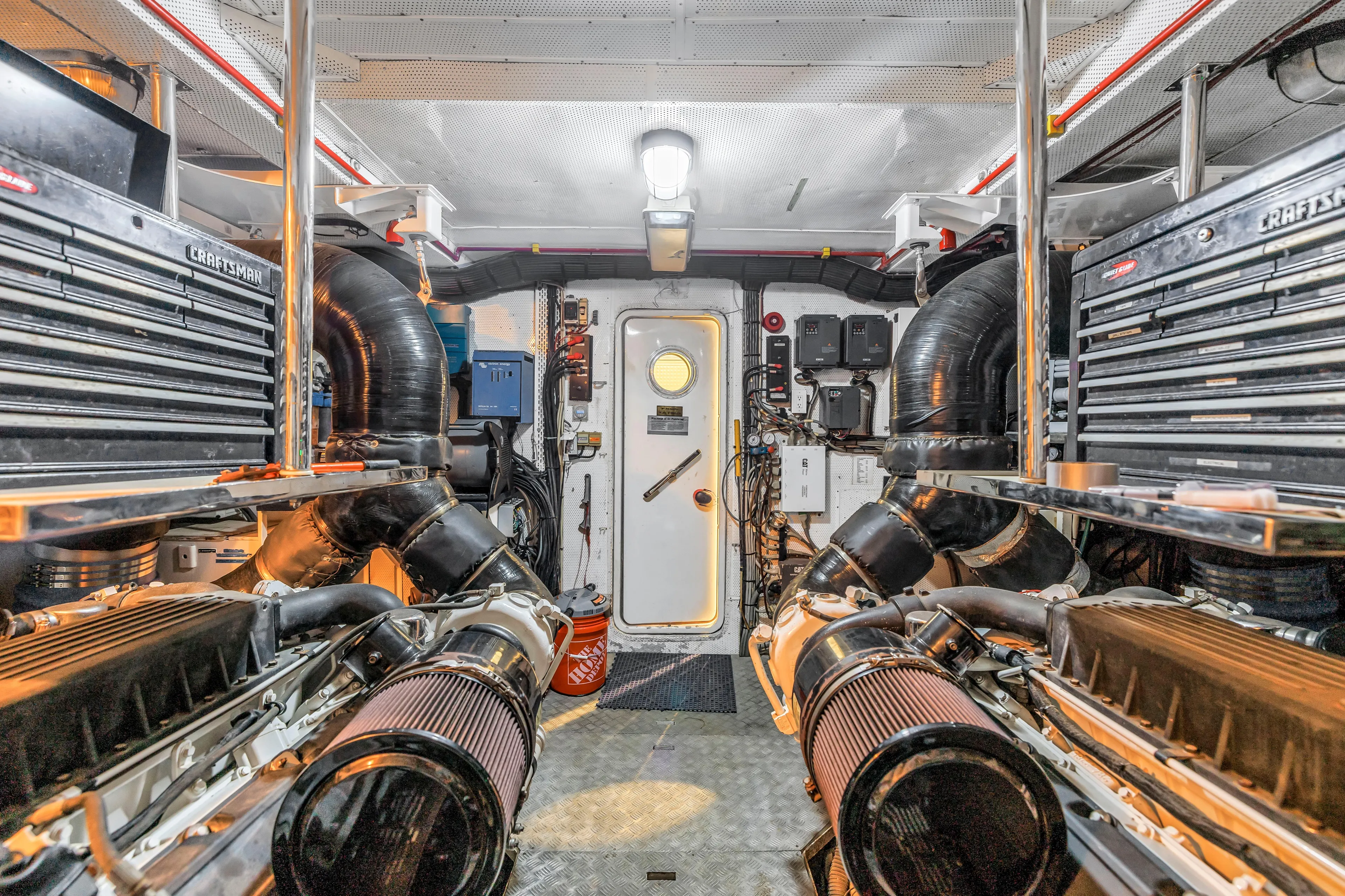 Star Saphire Yacht Photos Pics Engine room of 2007 Bilgin 117 yacht with machinery and tool storage.