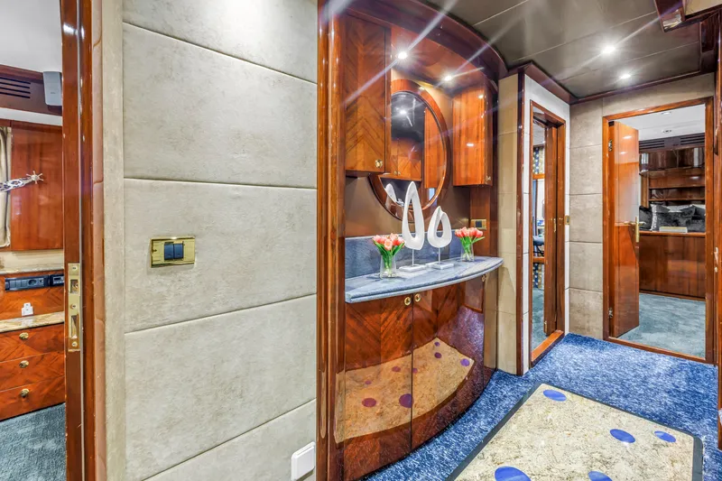 Star Saphire Yacht Photos Pics Luxurious interior of 2007 Bilgin 117 yacht with elegant wood finishes and modern decor.