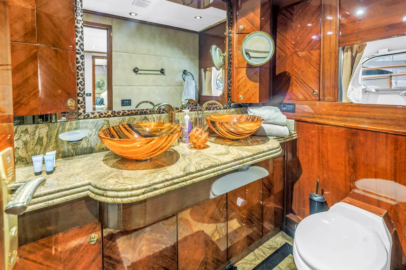 Star Saphire Yacht Photos Pics Luxurious yacht bathroom with elegant wood finishes and dual glass vessel sinks, Bilgin 117, 2007.