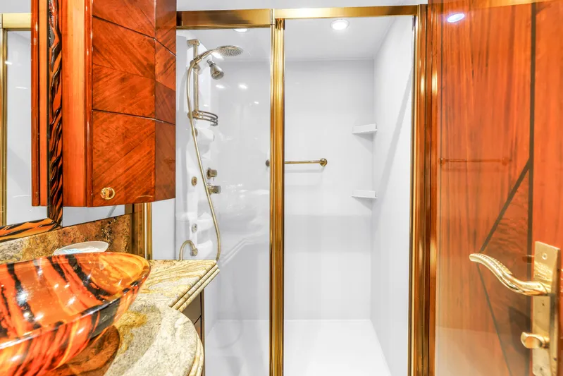 Star Saphire Yacht Photos Pics Luxurious Bilgin 117 yacht bathroom with elegant wood finishes and modern shower, 2007 model.