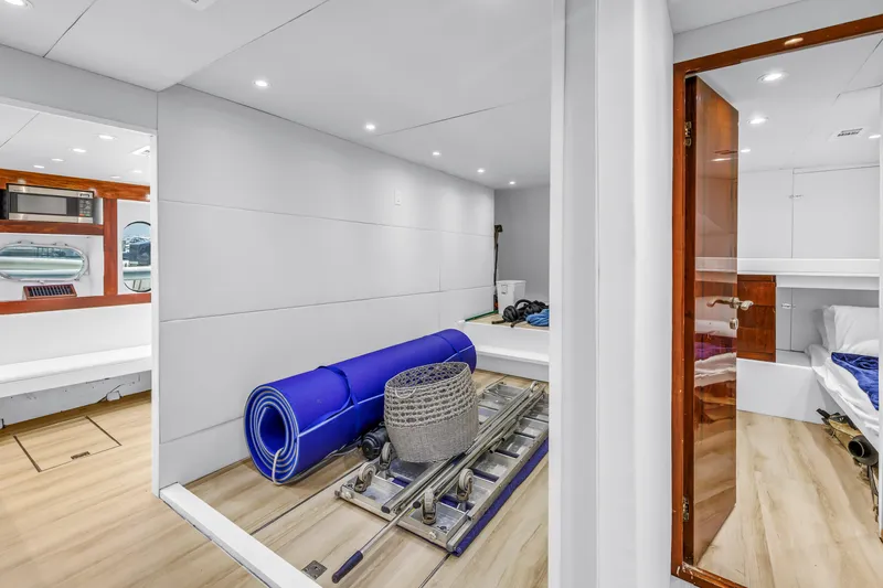 Star Saphire Yacht Photos Pics Interior of 2007 Bilgin 117 yacht with storage area and modern furnishings.