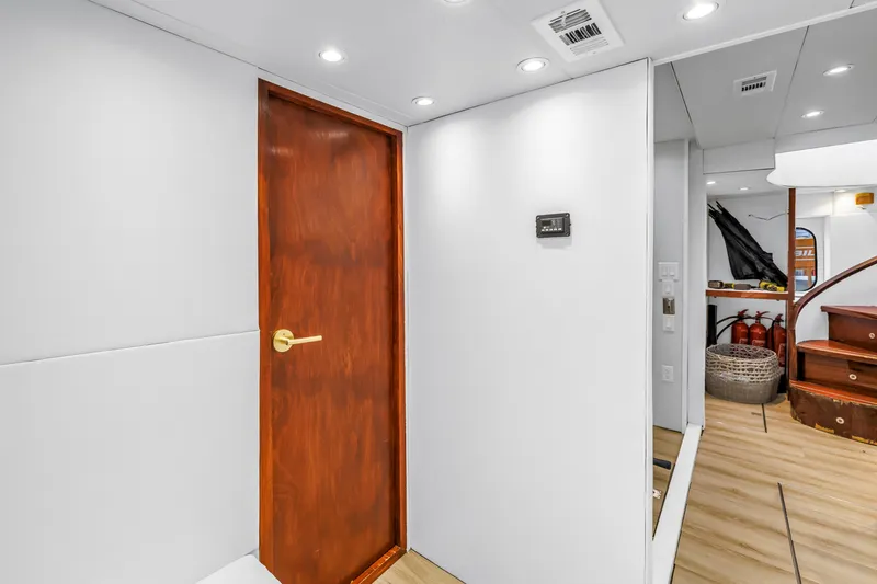 Star Saphire Yacht Photos Pics Interior of 2007 Bilgin 117 yacht with wooden door and modern design elements.