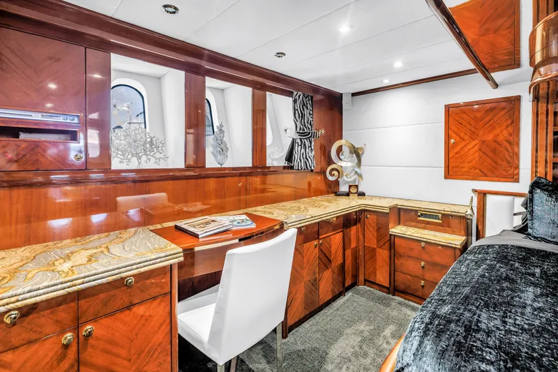 Star Saphire Yacht Photos Pics Luxurious Bilgin 117 yacht interior, featuring elegant wood cabinetry and marble countertops, 2007 model.