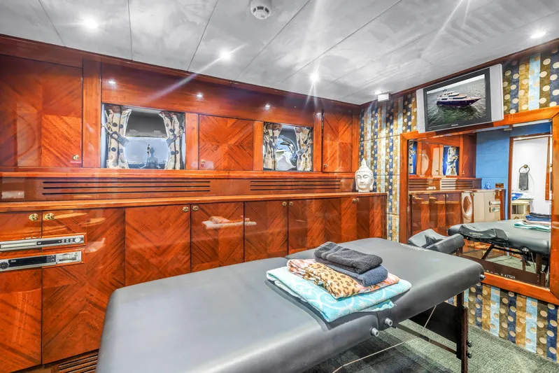 Star Saphire Yacht Photos Pics Luxurious yacht interior with massage table, Bilgin 117, 2007 model, elegant wood paneling.