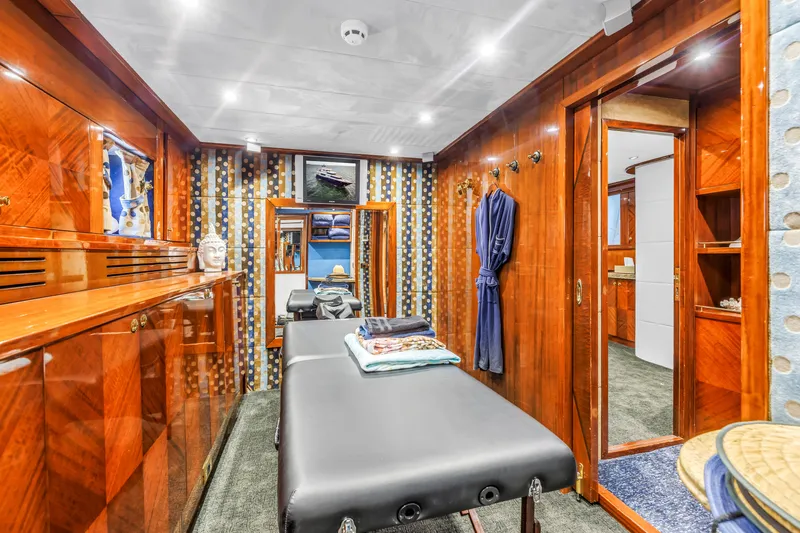 Star Saphire Yacht Photos Pics Luxurious yacht interior with massage table, wooden paneling, and decorative elements, Bilgin 117, 2007.