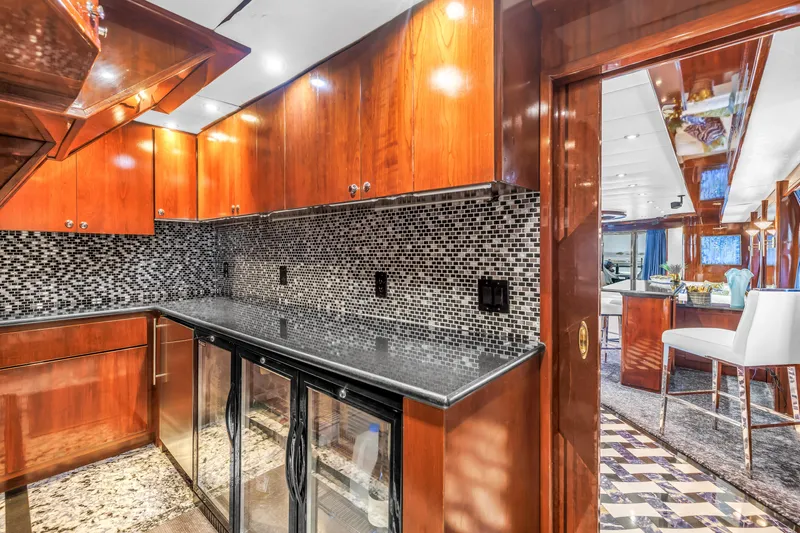 Star Saphire Yacht Photos Pics Luxurious yacht kitchen with wood cabinets, mosaic backsplash, and modern appliances, Bilgin 117, 2007.