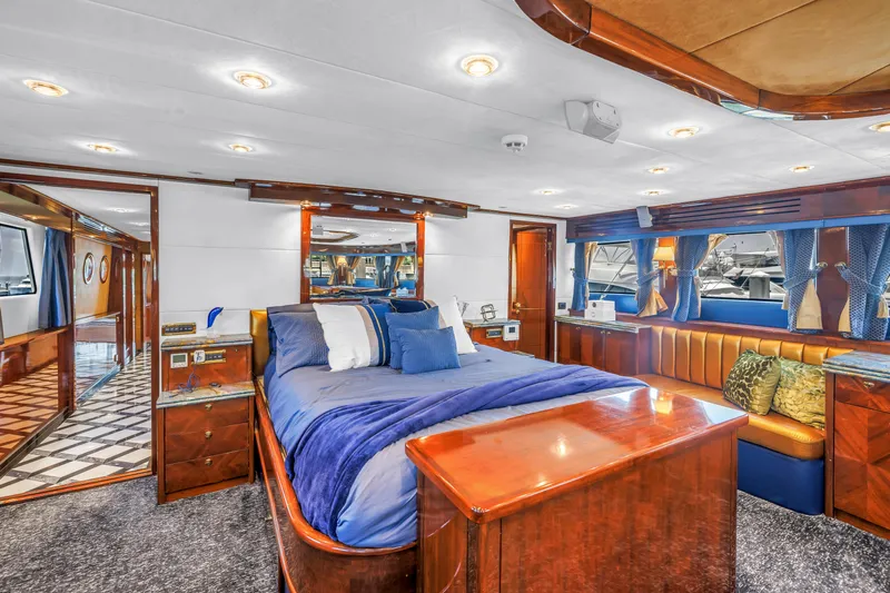 Star Saphire Yacht Photos Pics Luxurious bedroom interior on 2007 Bilgin 117 yacht with elegant wood finishes.