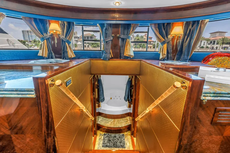 Star Saphire Yacht Photos Pics Luxurious interior of 2007 Bilgin 117 yacht with elegant wood and gold accents.