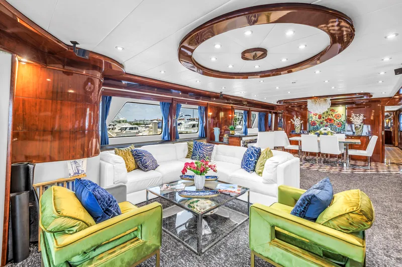 Star Saphire Yacht Photos Pics Luxurious Bilgin 117 yacht interior, 2007 model, featuring elegant seating and vibrant decor.