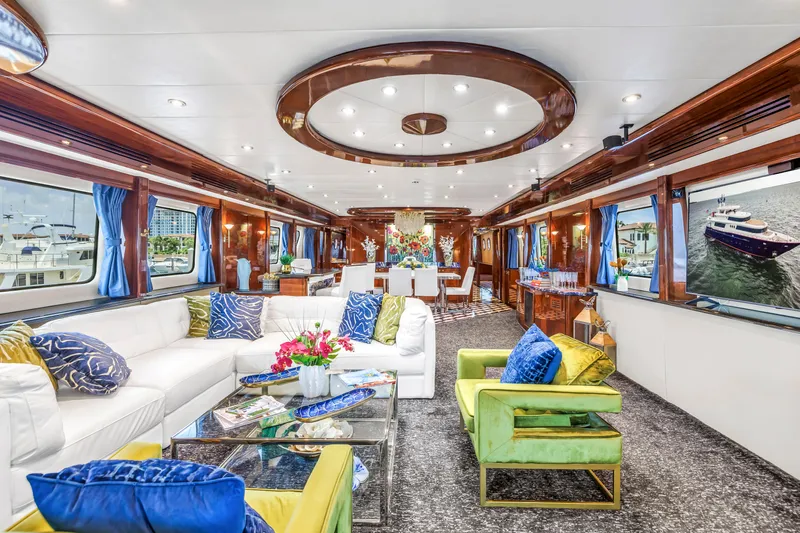 Star Saphire Yacht Photos Pics Luxurious interior of 2007 Bilgin 117 yacht with elegant seating and vibrant decor.