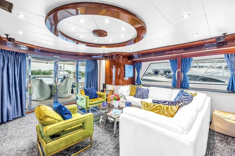 Star Saphire Yacht Photos Pics Luxurious Bilgin 117 yacht interior, 2007 model, featuring elegant seating and vibrant decor.