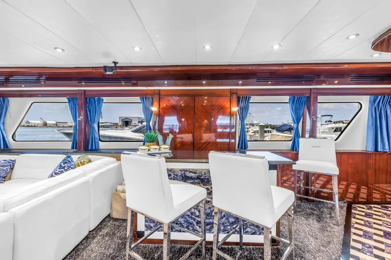 Star Saphire Yacht Photos Pics Luxurious interior of 2007 Bilgin 117 yacht with elegant seating and large windows.