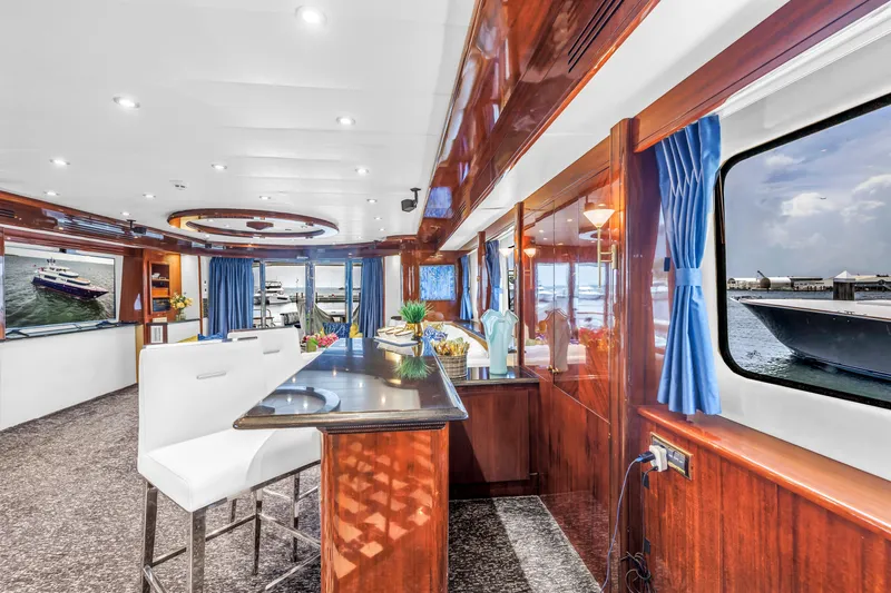 Star Saphire Yacht Photos Pics Luxurious interior of 2007 Bilgin 117 yacht with elegant wood finishes and waterfront views.