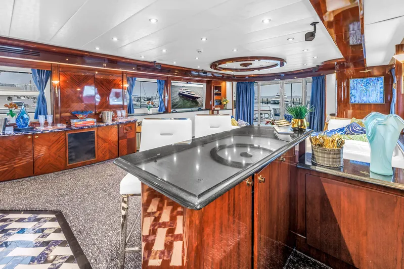 Star Saphire Yacht Photos Pics Luxurious interior of 2007 Bilgin 117 yacht with elegant wood finishes and modern decor.