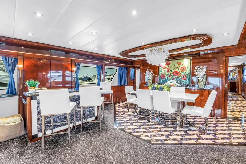 Star Saphire Yacht Photos Pics Luxurious interior of 2007 Bilgin 117 yacht with elegant dining area and modern decor.