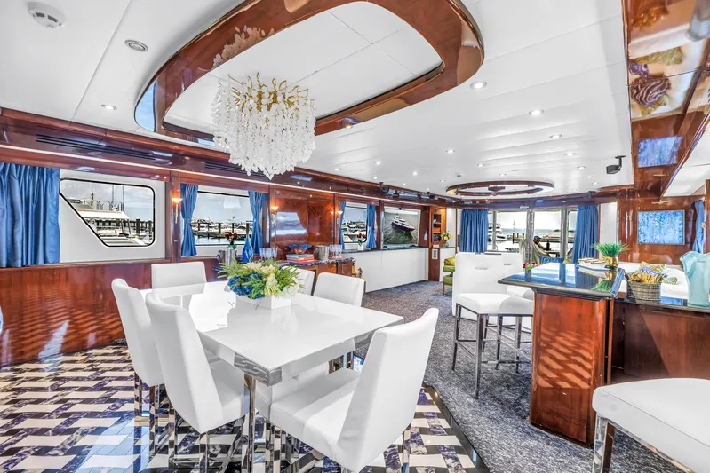 Star Saphire Yacht Photos Pics Luxurious 2007 Bilgin 117 yacht interior with elegant dining area and modern decor.