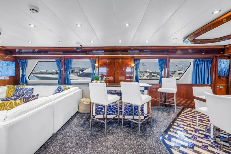 Star Saphire Yacht Photos Pics Luxurious interior of 2007 Bilgin 117 yacht with elegant seating and vibrant decor.