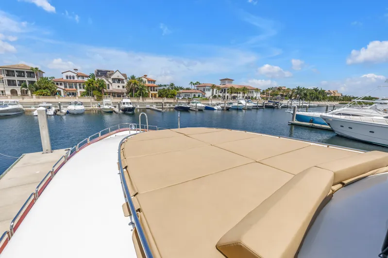Star Saphire Yacht Photos Pics Luxury yacht Bilgin 117 (2007) docked at marina with waterfront homes in background.