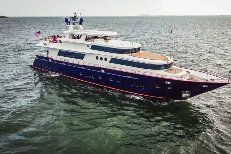 Star Saphire Yacht Photos Pics Luxurious 2007 Bilgin 117 yacht cruising on open water with American flag.