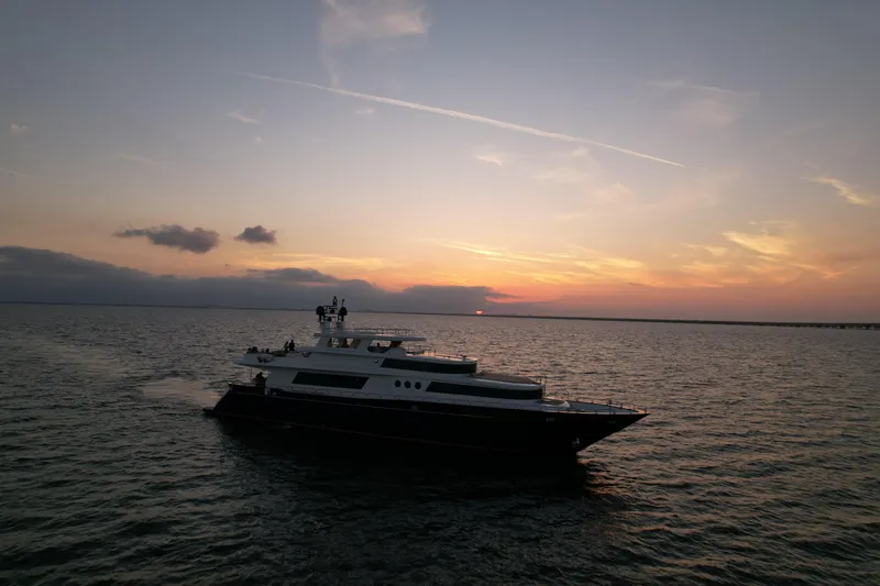 Star Saphire Yacht Photos Pics Luxury Bilgin 117 yacht cruising at sunset, 2007 model, serene ocean view.