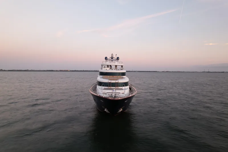 Star Saphire Yacht Photos Pics Front view of 2007 Bilgin 117 yacht on calm water at sunset.