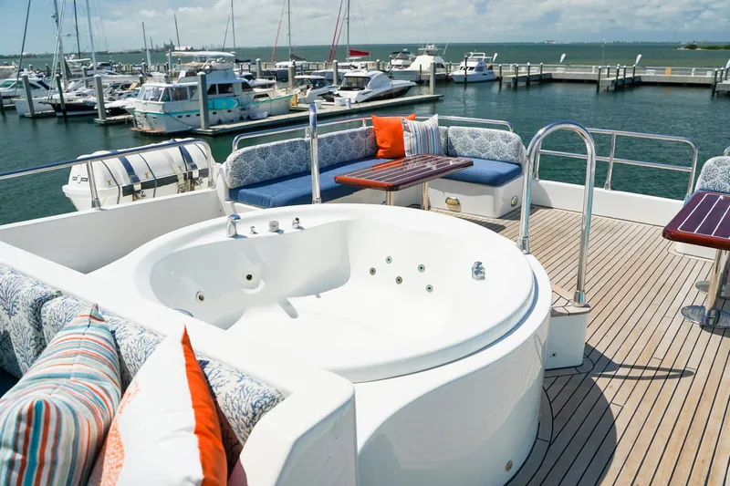 Star Saphire Yacht Photos Pics Luxurious Bilgin 117 yacht deck with jacuzzi and seating, docked at marina, 2007 model.