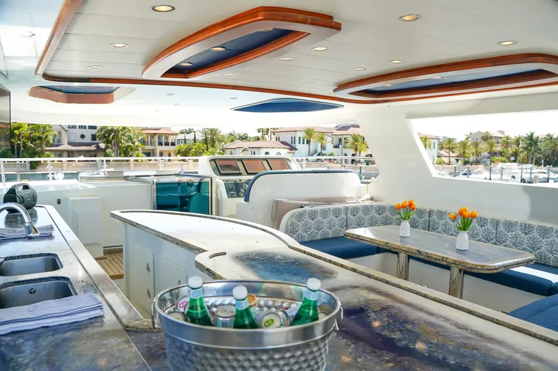 Star Saphire Yacht Photos Pics Luxurious 2007 Bilgin 117 yacht interior with elegant seating, bar, and scenic marina view.