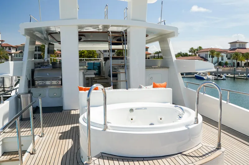 Star Saphire Yacht Photos Pics Luxurious 2007 Bilgin 117 yacht deck with jacuzzi and outdoor kitchen.