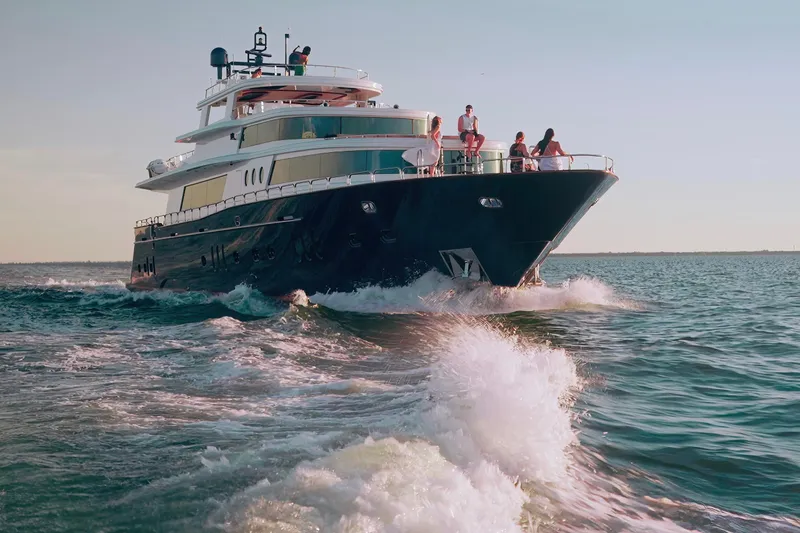 Star Saphire Yacht Photos Pics Luxurious 2007 Bilgin 117 yacht cruising on open water with passengers enjoying the view.