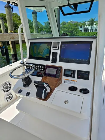 Yacht Photos Pics 2023 Caymas 30 CT boat dashboard with advanced navigation and control systems.