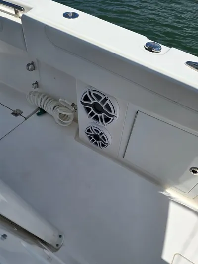  Yacht Photos Pics 2023 Caymas 30 CT boat interior with speakers and coiled rope.