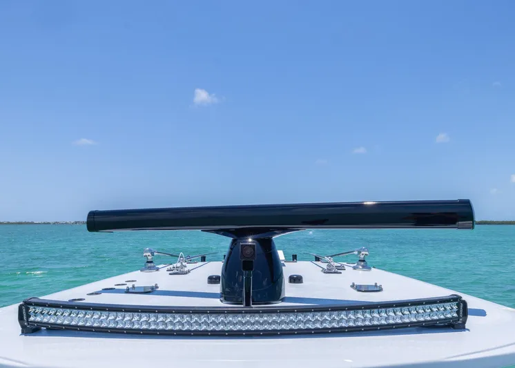  Yacht Photos Pics Invincible 38 Catamaran 2026 on turquoise water under clear blue sky.