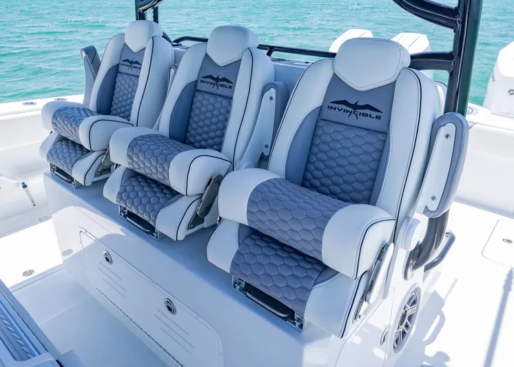  Yacht Photos Pics Luxurious seating on 2026 Invincible 38 Catamaran with ocean backdrop.