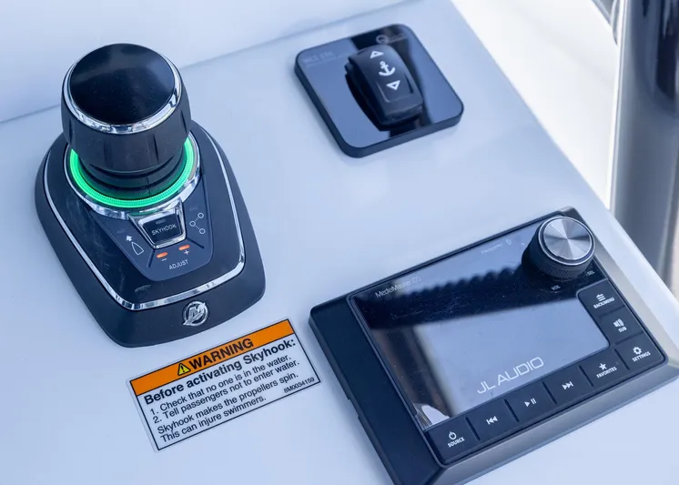  Yacht Photos Pics Control panel of 2026 Invincible 38 Catamaran featuring joystick and JL Audio system.