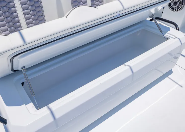  Yacht Photos Pics Open storage compartment on 2026 Invincible 38 Catamaran, showcasing spacious interior design.