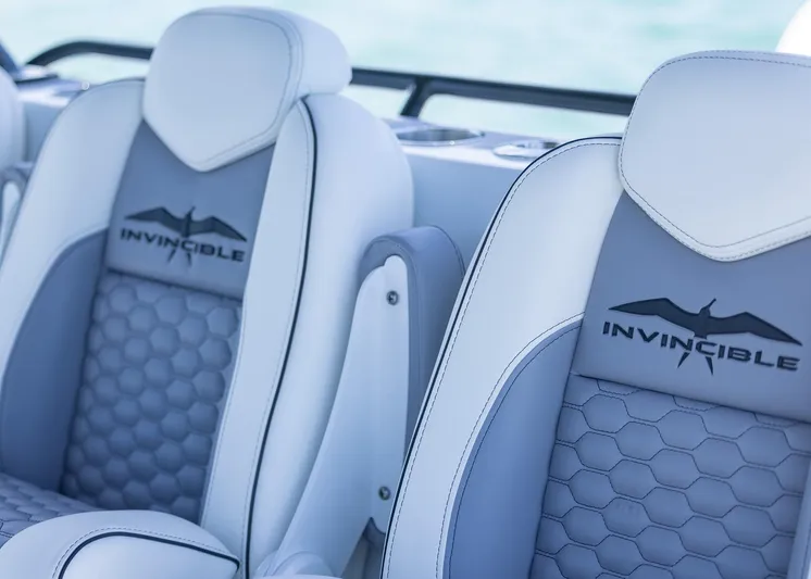  Yacht Photos Pics Luxury seating on 2026 Invincible 38 Catamaran with branded upholstery design.