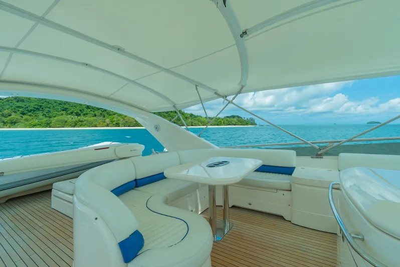 Blue Rose Yacht Photos Pics Luxurious 2006 Princess 23M yacht interior with ocean view and elegant seating.